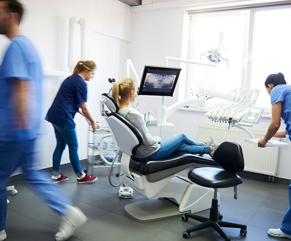 view-of-dentists-and-woman-in-dentists